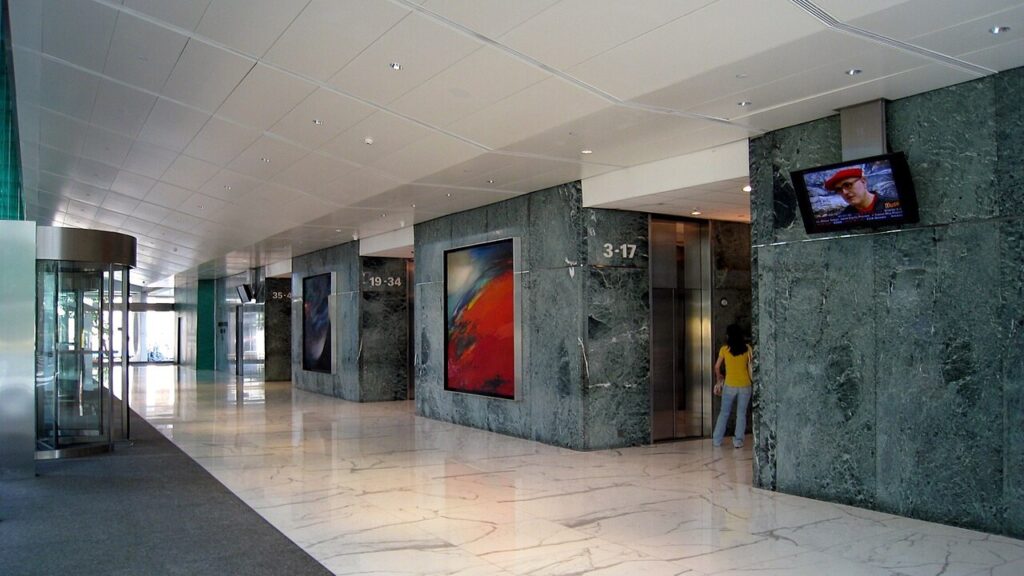 Lift lobby at Jardine House in Hong Kong, shown as a generic image for lift door-frame inspections