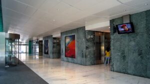 Lift lobby at Jardine House in Hong Kong, shown as a generic image for lift door-frame inspections